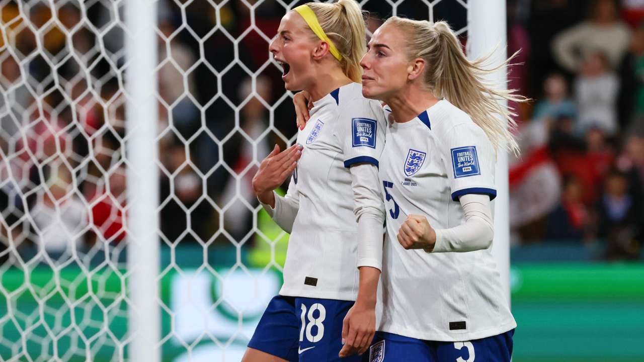 Chloe Kelly (left) celebrates with Alex Greenwood after scoring England's winning goal